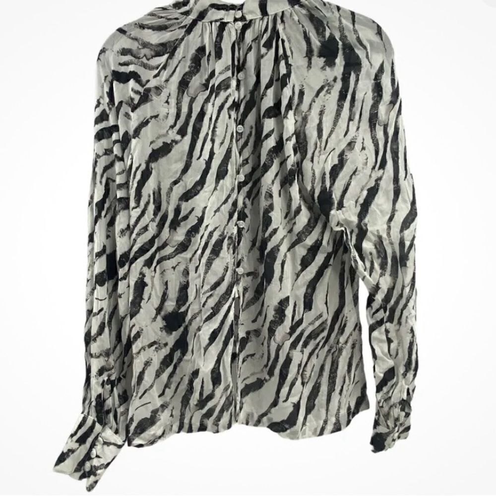 Zebra print long sleeved smocked blouse